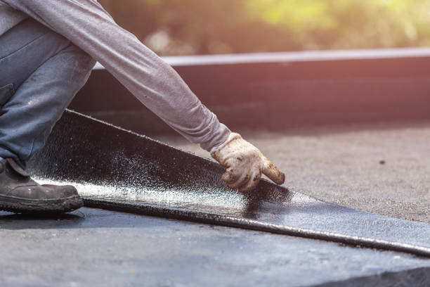Professional Waterproofing technician working in Ashville, OH